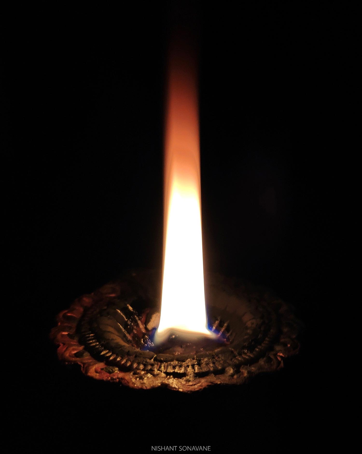 Diya lamp photographed during a festival