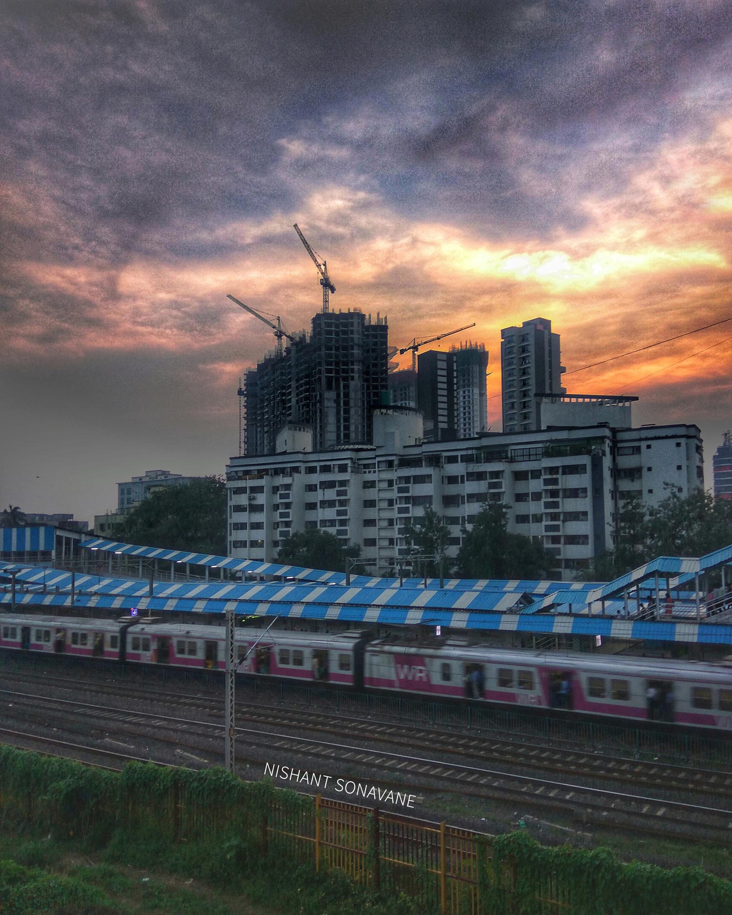 Sunset at Ram Mandir railway station in Mumbai